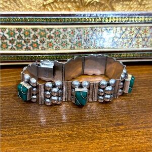 Mexico sterling silver carved green Onyx hinged panel bracelet.